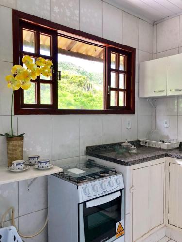 Dapur atau dapur kecil di Pousada Recanto Das Emerências