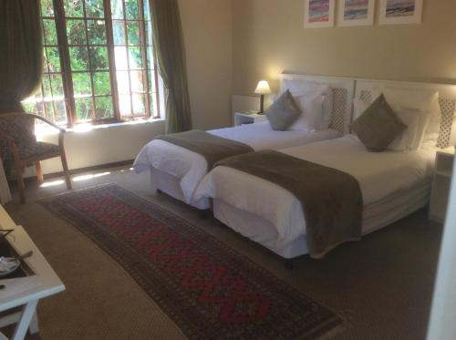 Postel nebo postele na pokoji v ubytování Baleia Guest Lodge