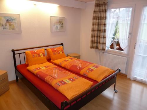 Кровать или кровати в номере Hotel Restaurant Sunnmatt