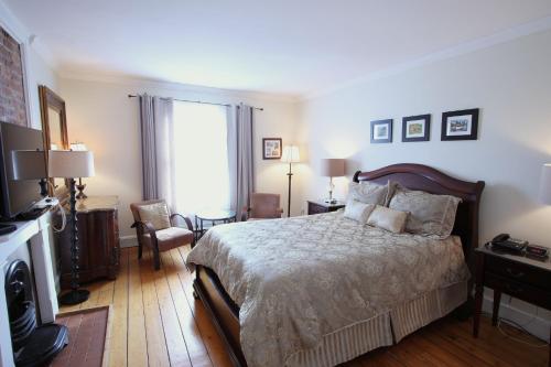 Postel nebo postele na pokoji v ubytování The Rendell Shea Manor