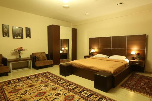 Кровать или кровати в номере Отель Петровский