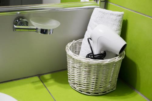 Koupelna v ubytování Hotel Corona