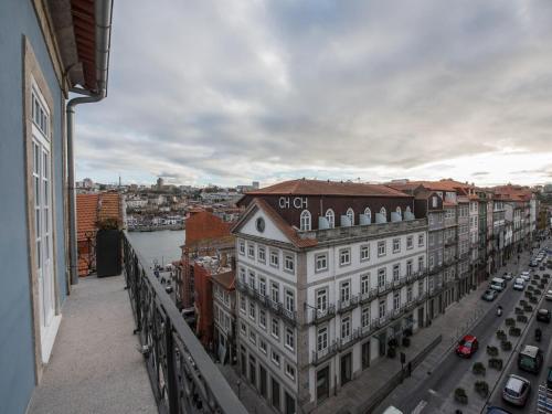 a view of a building from a balcony at Apartamentos The Arc Carrís in Porto
