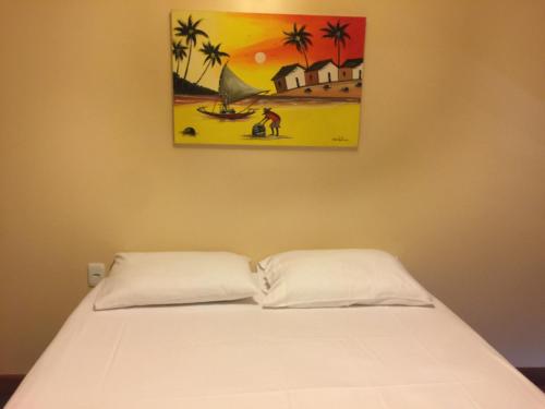 A bed or beds in a room at PKL - Pousada Kite Life