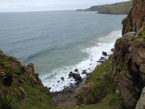 a view of the ocean from a cliff at Hillside View Guesthouse in Coffee Bay
