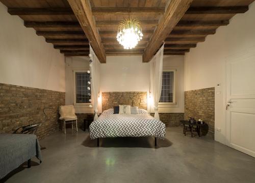 Posteľ alebo postele v izbe v ubytovaní Zucchero sui Baffi- Food Lovers B&B