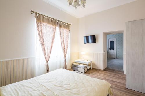 Ліжко або ліжка в номері Lovely apartment in the city center