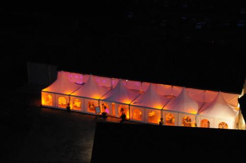a lit up building with lights on it at night at Château de Mazières in Tendu