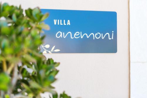 a sign that reads willa amontont at Philoxenia Villas in Panormos Rethymno