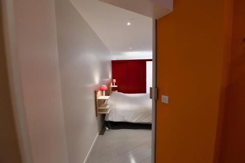 Ένα ή περισσότερα κρεβάτια σε δωμάτιο στο Appartement Week-end