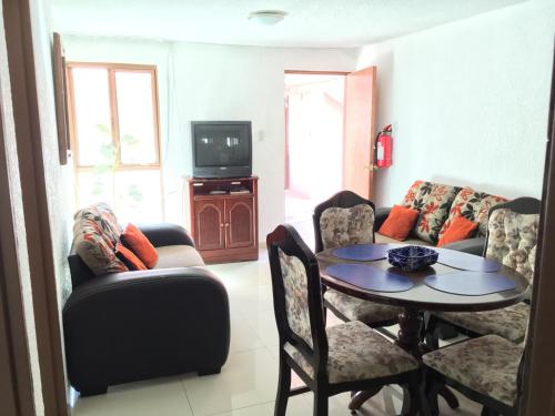 Zona de estar de Departamentos Maggio