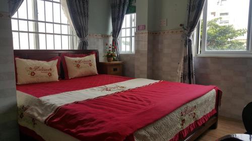 Ένα ή περισσότερα κρεβάτια σε δωμάτιο στο Hoang Linh Hotel