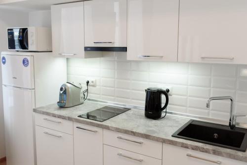 Dapur atau dapur kecil di M&M Aparthotel VIP