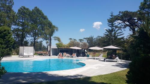 Swimmingpoolen hos eller tæt på Hotel Club de La Barra