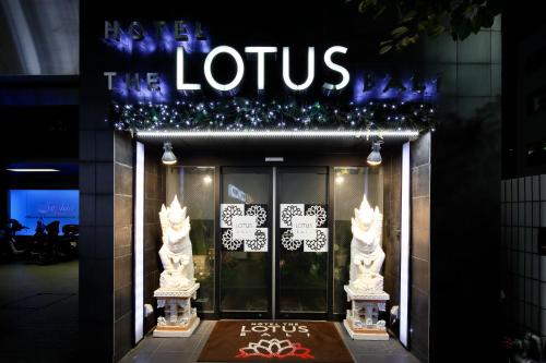 a store front with a sign for the latius nightclub at Hotel The Lotus Bali (Adult Only) in Kawasaki