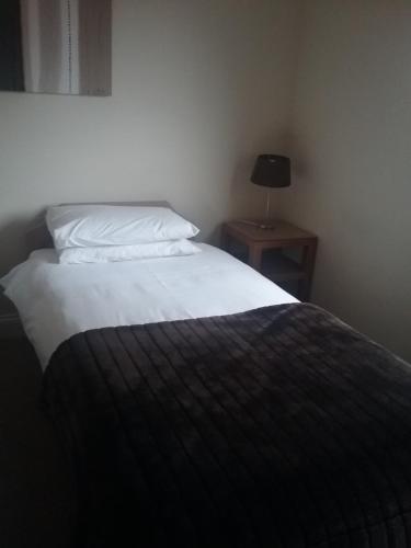 Cama o camas de una habitación en Shangri-la bed and breakfast