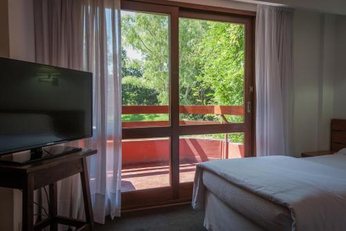Μια τηλεόραση ή/και κέντρο ψυχαγωγίας στο Hotel del Bosque