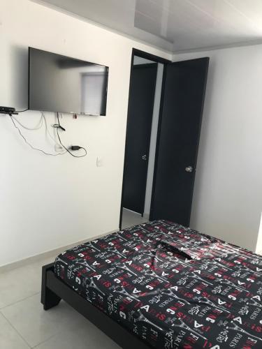 Ένα ή περισσότερα κρεβάτια σε δωμάτιο στο Arboleda el Campestre