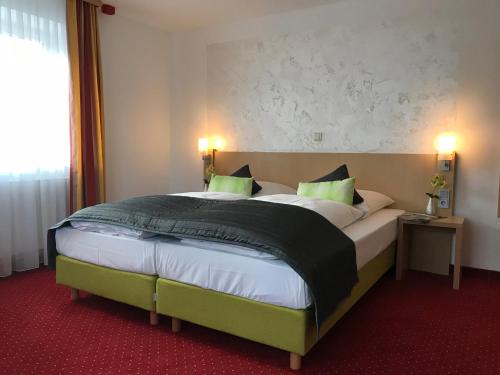 Ένα ή περισσότερα κρεβάτια σε δωμάτιο στο Waldgasthof St.Wolfgang