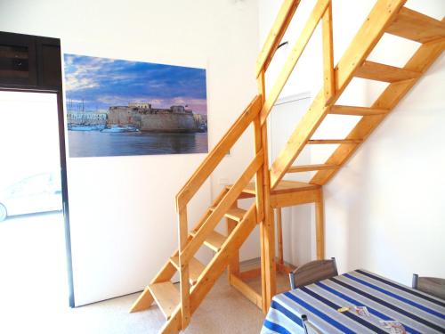 Postel nebo postele na pokoji v ubytování Raffaela Casa Vacanze