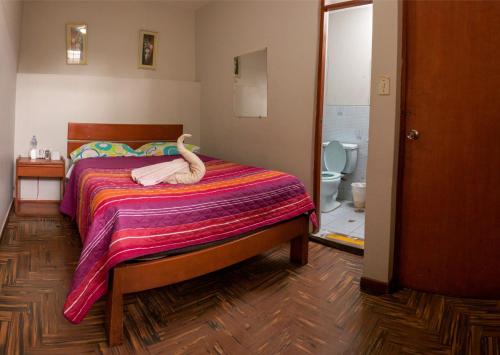 Cama o camas de una habitación en Hotel Olímpica