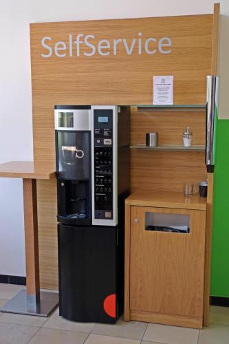 a kitchen with a microwave and a counter at Kloster Neustadt in Neustadt an der Weinstraße
