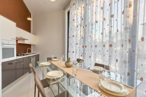 Kuchyň nebo kuchyňský kout v ubytování Apartments Villa YoYo