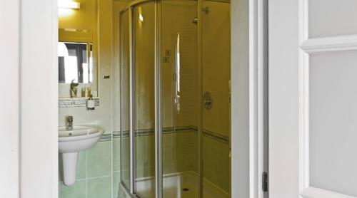 Um banheiro em Residence Arx & Wellness