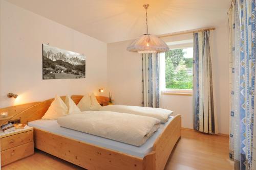 Postel nebo postele na pokoji v ubytování Haus Tannenburg