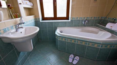 Um banheiro em Residence Arx & Wellness
