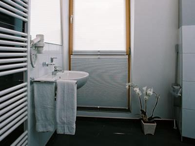 Vannas istaba naktsmītnē AKZENT Hotel Altenberge