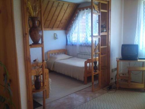 Postel nebo postele na pokoji v ubytování Family Hotel Markony
