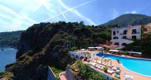 an aerial view of a resort with a pool at Hotel Carasco in Lipari
