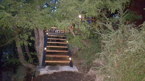 an overhead view of a set of stairs with lights at Pendientes de Moquehue in Moquehue