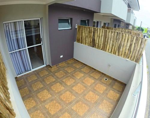 a view from the balcony of a house at Don Marcos Hotel com Restaurante e Pizzaria in Guarujá