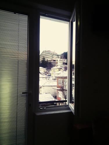 a window with a view of a city at NULI apartments in Kruševo