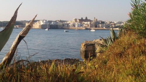 a view of a body of water with boats at B&B Lilium Otranto in Otranto