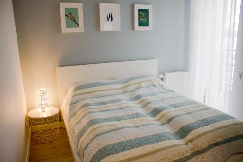 Ένα ή περισσότερα κρεβάτια σε δωμάτιο στο Apartamenty Rynek w samym centrum Ustronia - Dream Apart
