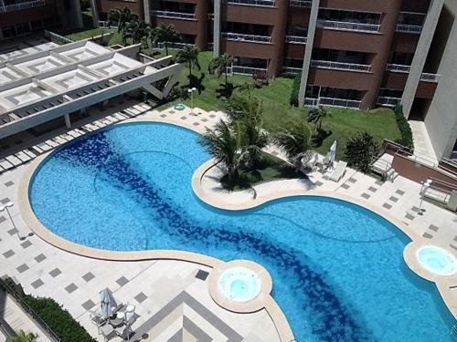 an overhead view of a large swimming pool in a building at Scopa Beach Resort Fontenelle in Aquiraz