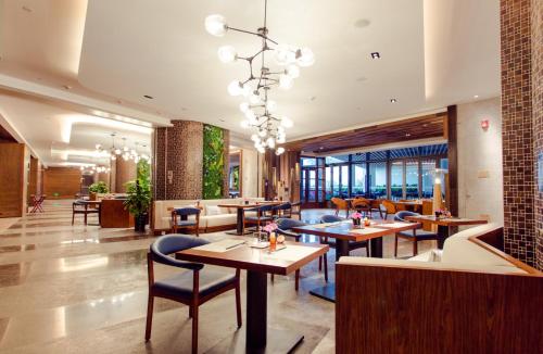 Restoranas ar kita vieta pavalgyti apgyvendinimo įstaigoje Sanya Conifer Resort