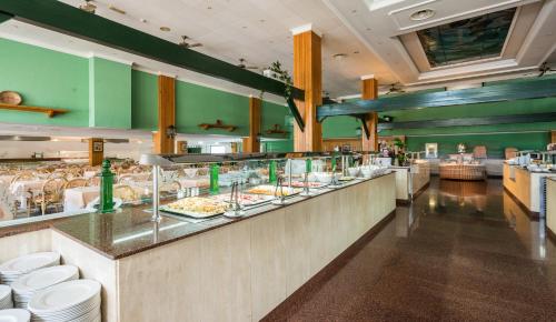 
a kitchen filled with lots of different types of food at Blue Sea Costa Bastian in Costa Teguise
