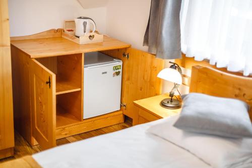 Postel nebo postele na pokoji v ubytování Górskie Wspomnienie