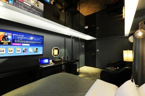 Et tv og/eller underholdning på Rainbow Hotel Yongsan