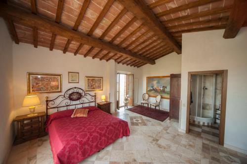 Ένα ή περισσότερα κρεβάτια σε δωμάτιο στο Agriturismo Podernuovo