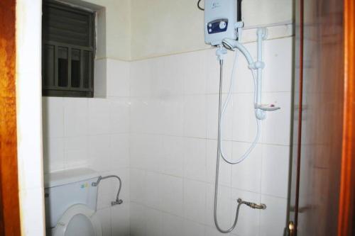 Ванна кімната в Palm world Hotels Mbarara