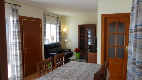 a dining room with a table and a chair at Vera Rental Thalassa II in Vera