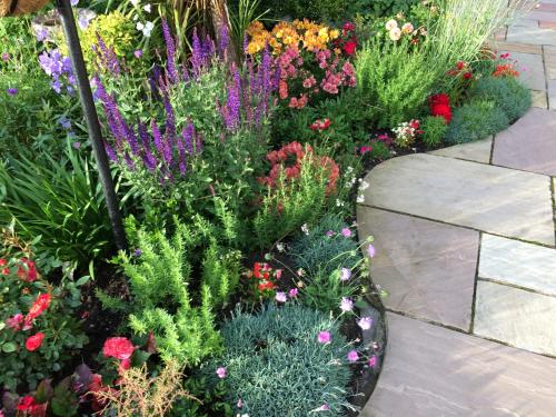a garden with many different types of flowers at Castlecroft Bed and Breakfast in Stirling