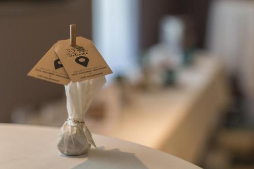 a piece of paper on a toothpick in a plastic bag at ibis Styles Luzern in Luzern