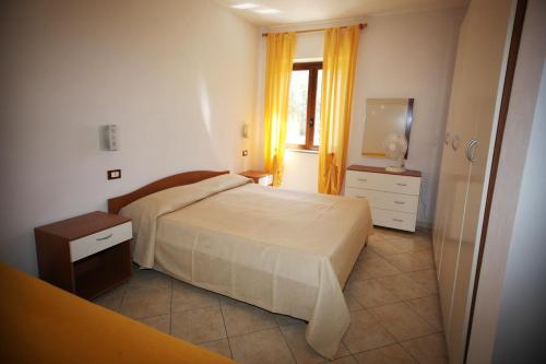 Кровать или кровати в номере Villa Macria