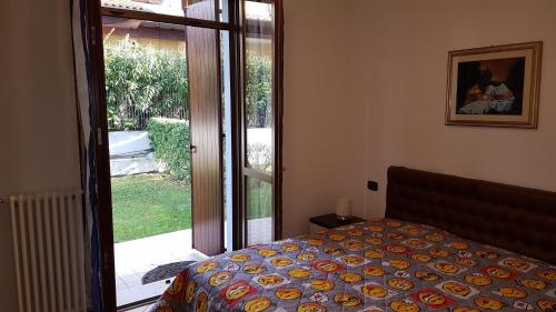 Tempat tidur dalam kamar di Villa Villacolle
